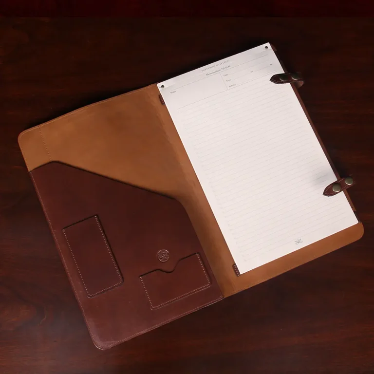 no 28 legal size leather portfolio in tobacco buffalo on a wood table - open view