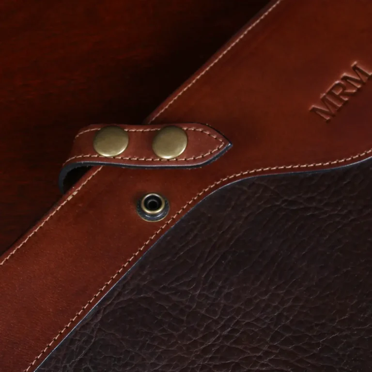 no 28 legal size leather portfolio in tobacco buffalo on a wood table - snap view