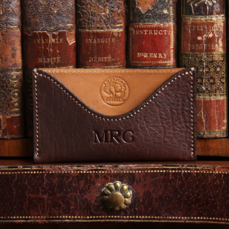 no3 card wallet in tobacco brown american buffalo on shelf with vintage books