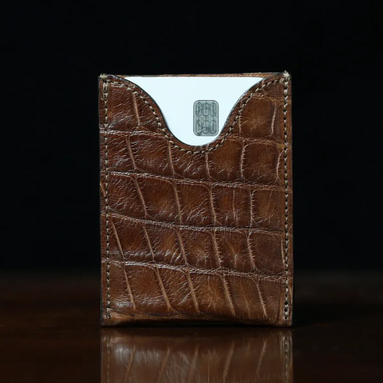 front view of the no 4 card case with a case inside, the wallet is made of american alligator leather