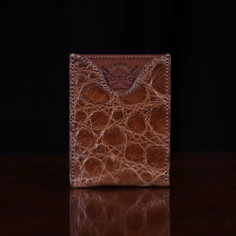 No. 4 Card Case in Vintage Brown American Alligator - ID 003 - front view on a wood table and dark background