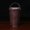 No. 20 Tobacco Brown American Buffalo Traveler Set on wood table - back view