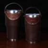 No. 20 and No. 30 Tobacco Brown American Buffalo Traveler Set on wood table with dark background