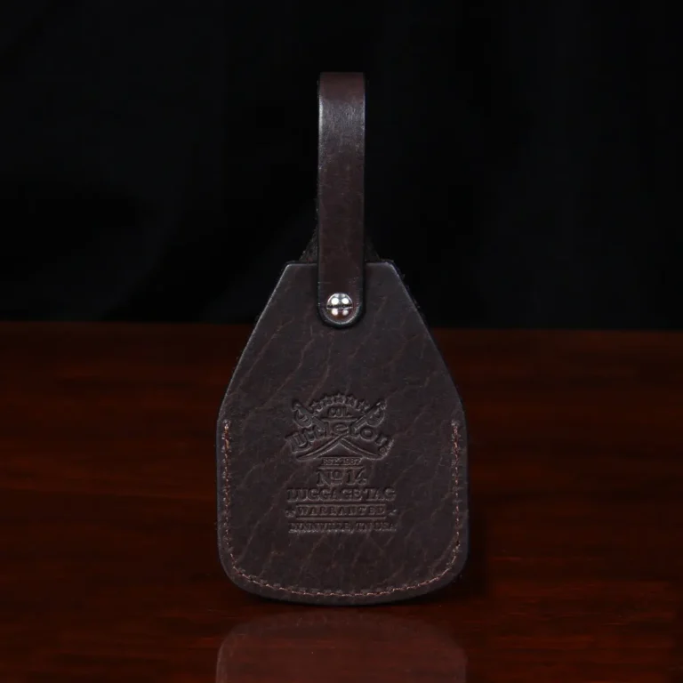 back view Tobacco Brown American Buffalo Luggage Tag on wood table with CL Buffalo