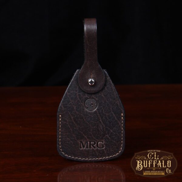 front view Tobacco Brown American Buffalo Luggage Tag on wood table with CL Buffalo logo in bottom right hand corner