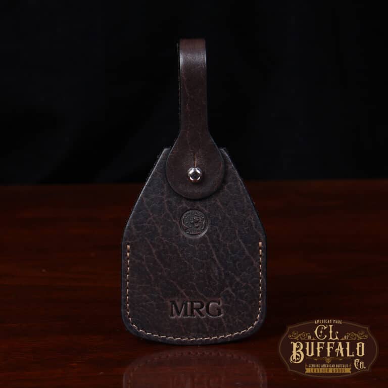 front view Tobacco Brown American Buffalo Luggage Tag on wood table with CL Buffalo logo in bottom right hand corner