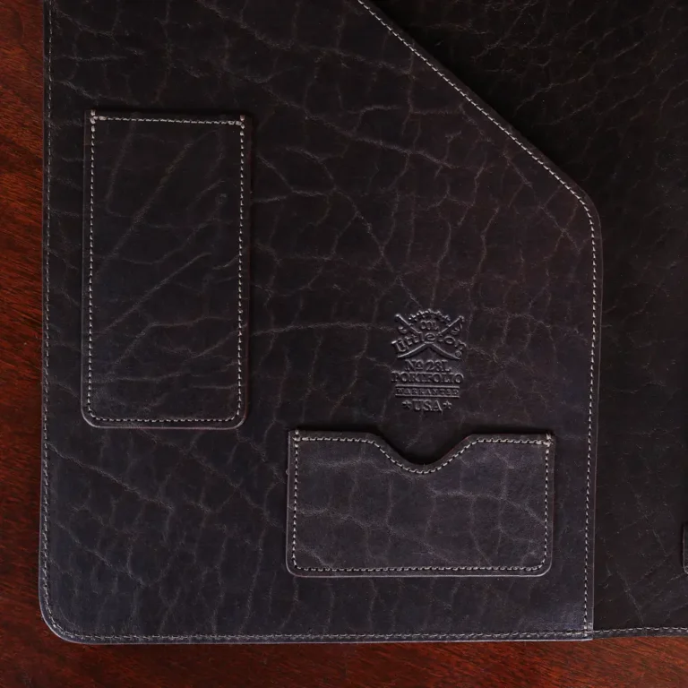 no 28 legal portfolio in American alligator - view of pockets - on a dark background