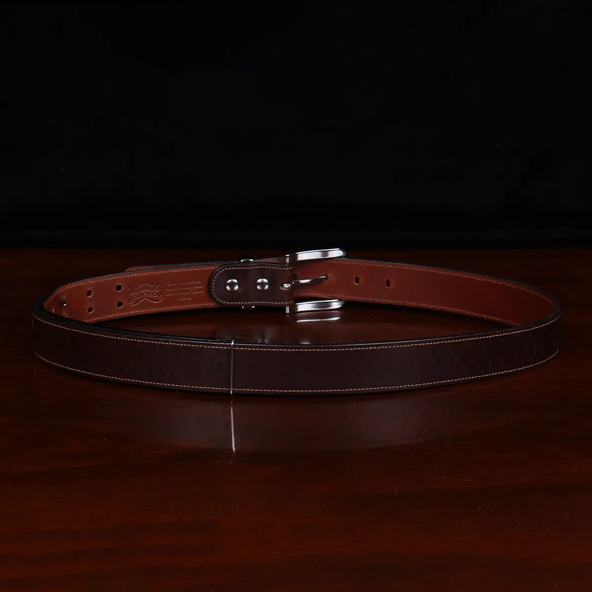 no 4 tobacco buffalo belt - back view on wooden table