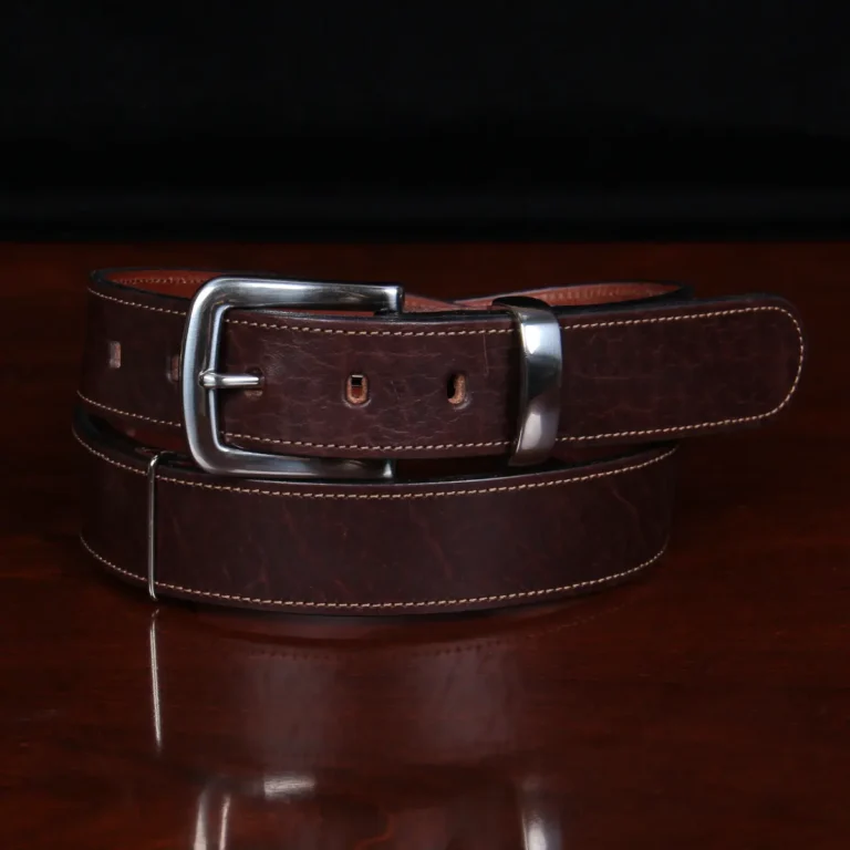 no 4 tobacco buffalo belt - coiled front view on wooden table