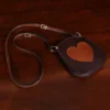 small leather purse with heart on front