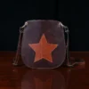 Bella bags in Tobacco Brown American Buffalo with leather patches on front - star - front view