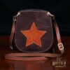 small leather purse with star on front
