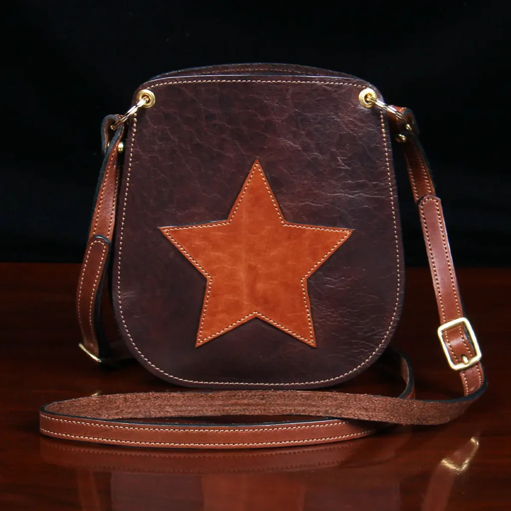 small leather purse with star on front