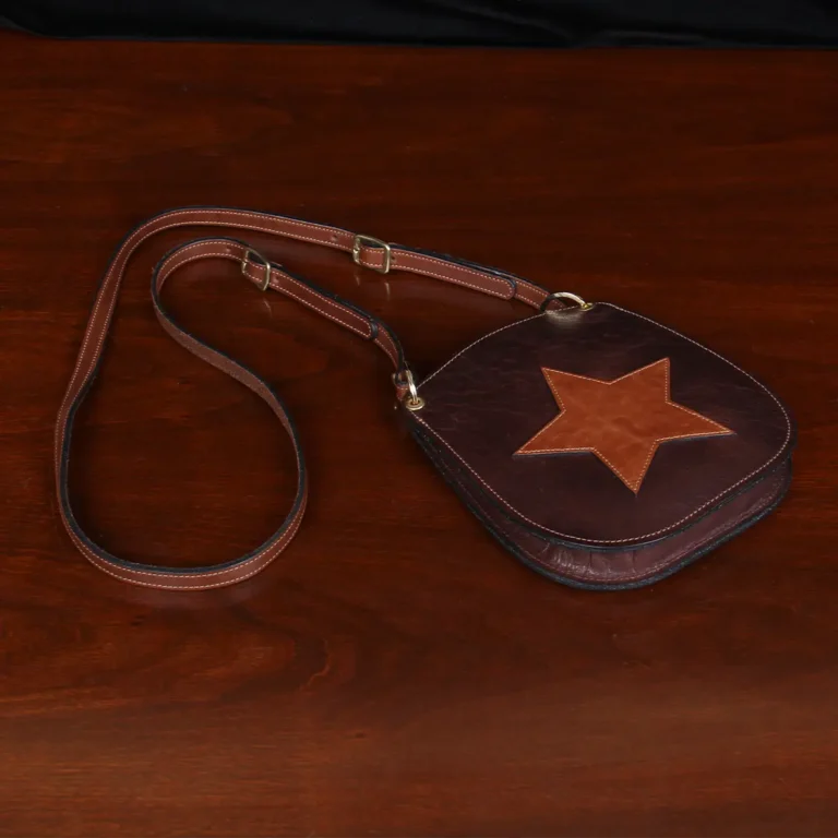 small leather purse with star on front