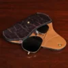 open view of leather aviator case with sunglasses coming out