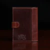 back view of dark brown leather wallet with snap closure