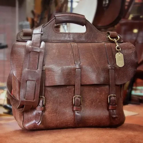 Colonel's personal No. 1 Saddlebag Briefcase resting on a table after having been carried for 20+ years