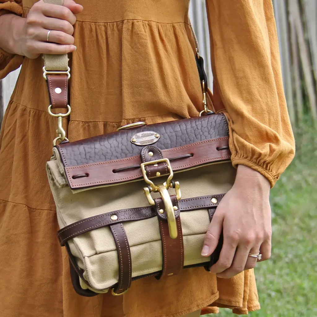 Women wearing GP2 Ladies Backpack in Tobacco Brown American Buffalo and Khaki Canvas