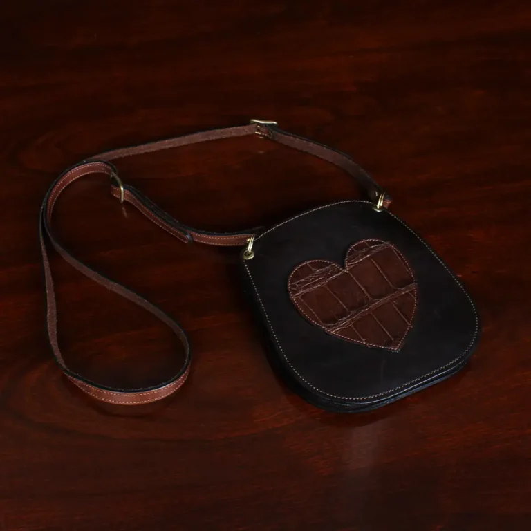 Bella Bag Ladies' Crossbody Purse in Tobacco Brown American Buffalo with Vintage Brown Steerhide Strap and American Alligator heart on front - ID 001 - strap view on vintage black background