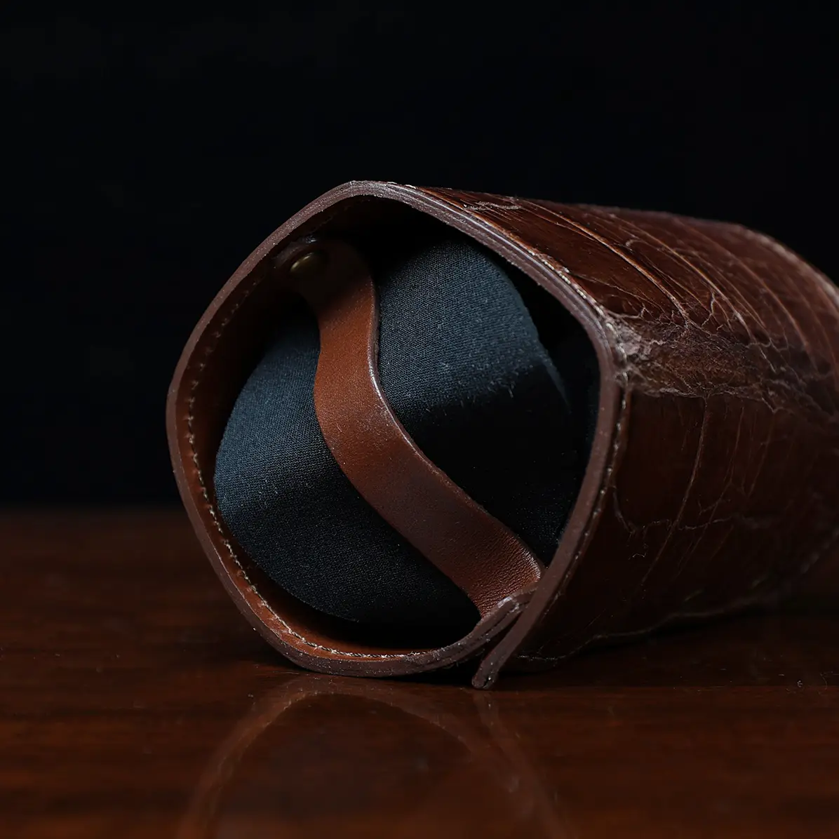 View larger image of Colonel Can Caddy in brown American Alligator - Single - ID 003 - bottom view with a black background