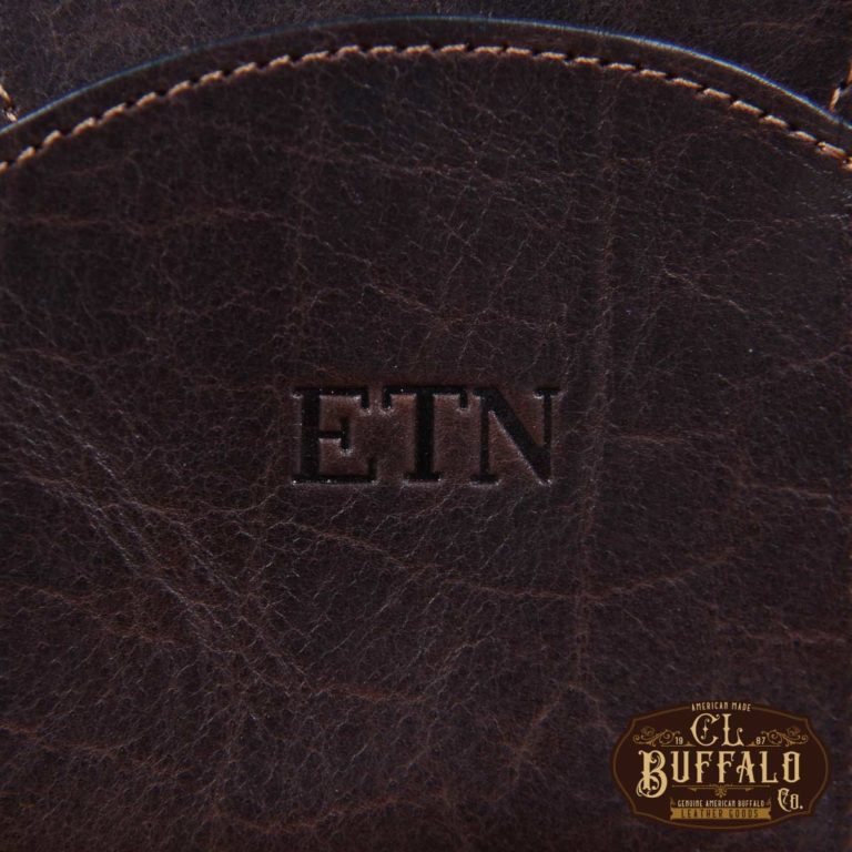 Dark brown american buffalo leather Front Pocket Wallet with fold-over flap - detail view of stamped personalization
