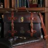 No. 1943 Navigator Briefcase in Tobacco Brown American Buffalo sitting on chair in office