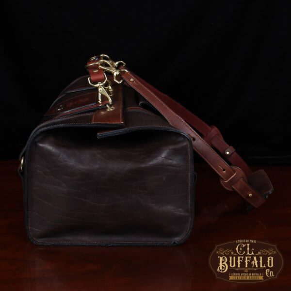 Side view of No. 1 leather duffel in Tobacco Brown American Buffalo with Steerhide trim