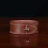 cuff-bracelet-alligator-no28-back view- on a wooden table with a dark background