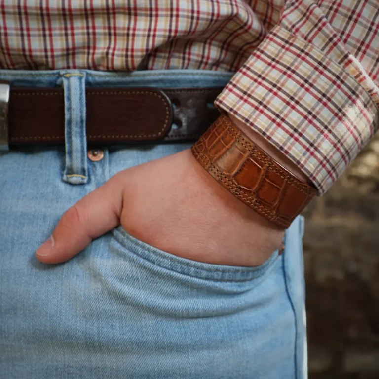 man wearing an american alligator cuff bracelet