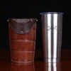 No. 20 Traveler Tumbler Sleeve Set in American Alligator with Tobacco Brown American Buffalo Trim - 20oz stainless steel tumbler - ID 001 - front view with tumbler on a black background