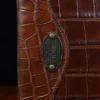 No. 30 Composition Journal in Vintage Brown American Alligator - ID 001 - front view of personalization on a black background
