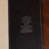 No. 30 Composition Journal in Vintage Brown American Alligator - ID 001 - open view of logo on a black background