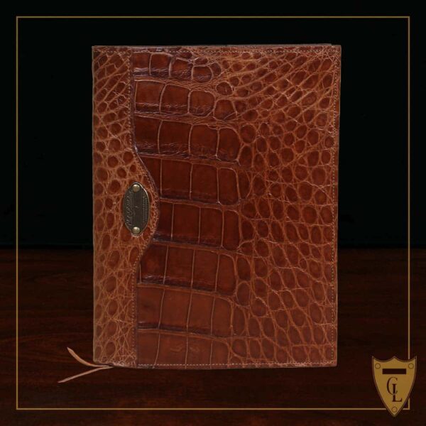 No. 30 Composition Journal in brown American Alligator - ID 002 - front view cut out on a black background