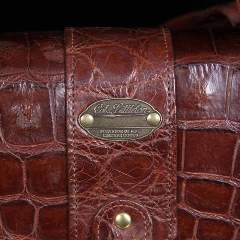 No. 1 Grip Travel Duffel Bag in Vintage Brown American Alligator - serial number 009 - detail view of personalization plate