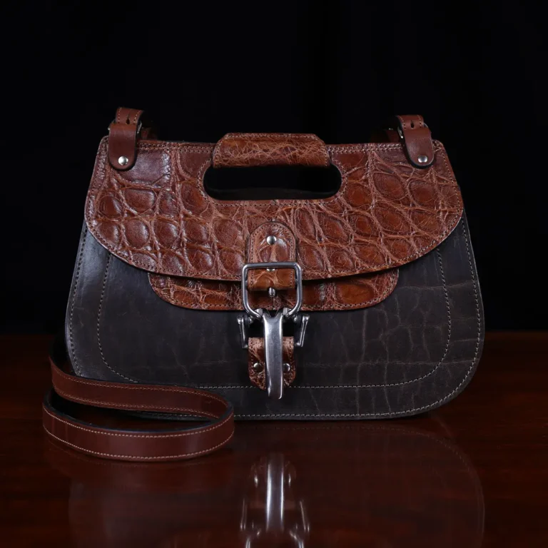 No. 17 Hunt Bag ladies' crossbody in dark Tobacco Brown American Buffalo and trimmed with American Alligator and Vintage Brown American Steerhide - 001 - Front view on black background