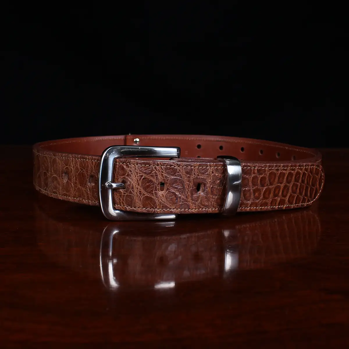 No. 4 Belt in brown American Alligator and silver buckle - ID 002 - front view on black background