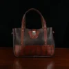 Leather Bentley Tote in dark Tobacco Brown American Buffalo trimmed with American Alligator and Vintage Brown Steerhide - Front View on black background