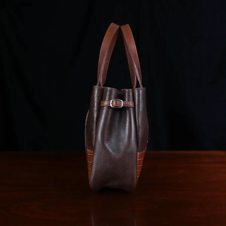 Leather Bentley Tote in dark Tobacco Brown American Buffalo trimmed with American Alligator and Vintage Brown Steerhide - side View on black background