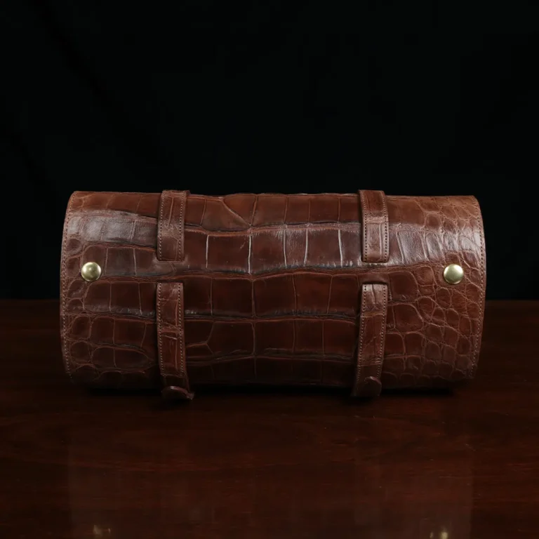 CL - No. 2 Shave Dopp Kit in Vintage Brown American Alligator with No. 8 Khaki Cotton Canvas Lining - Serial Number 002 - back rolled view on a wooden table