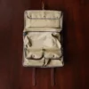 No. 2 Shave Dopp Kit in Vintage Brown American Alligator with No. 8 Khaki Cotton Canvas Lining - Serial Number 002 - inside view on a wooden table with a dark background