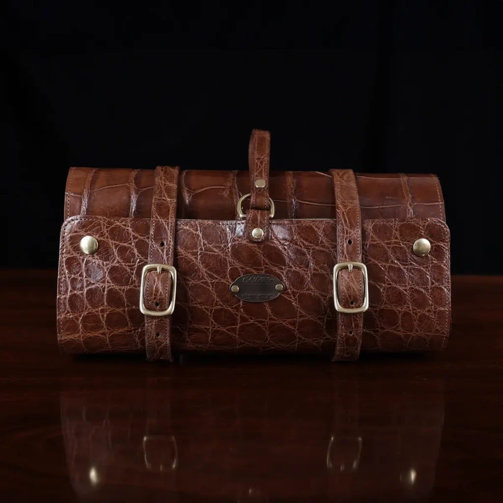 CL - No. 2 Shave Dopp Kit in Vintage Brown American Alligator with No. 8 Khaki Cotton Canvas Lining - Serial Number 002 - front view on a wooden table