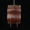 CL - No. 2 Shave Dopp Kit in Vintage Brown American Alligator with No. 8 Khaki Cotton Canvas Lining - Serial Number 002 - open back view of alligator scaled on a wooden table