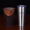 No. 20 Traveler Tumbler Sleeve Set in Tobacco Brown American Buffalo with American Alligator Trim - 20oz stainless steel tumbler - ID 001 - stainless tumbler cup on right with logo printed on front and empty alligator leather sleeve on right