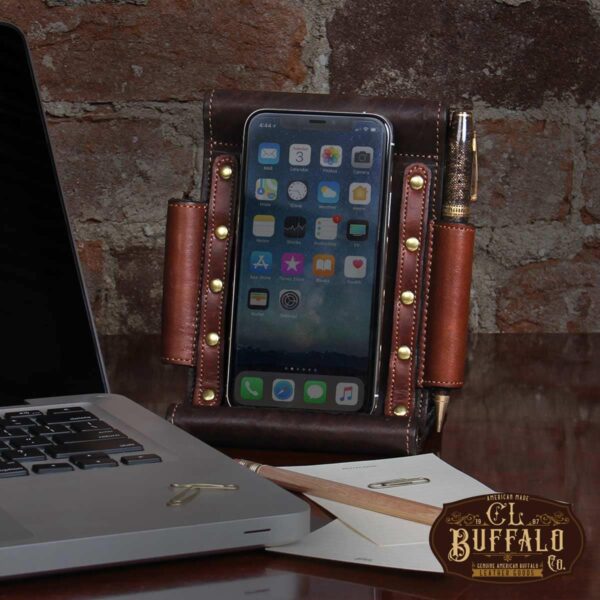 Tobacco Brown American Buffalo Phone Stand Holder with phone on desk next to laptop