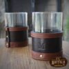 Veranda Glasses in Tobacco Brown American Buffalo with vintage brown steerhide trim - Two glasses on an outdoor coffee table