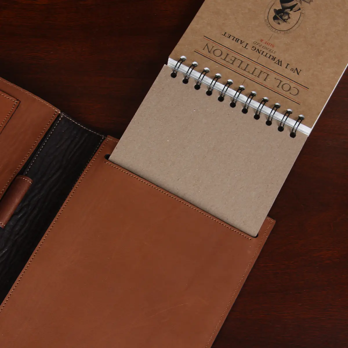 No. 1 Steno Padfolio in Tobacco Brown American Buffalo with Vintage Brown Steerhide Trim - open view of notepad showing inside front cover with a quote from Colonel printed on it