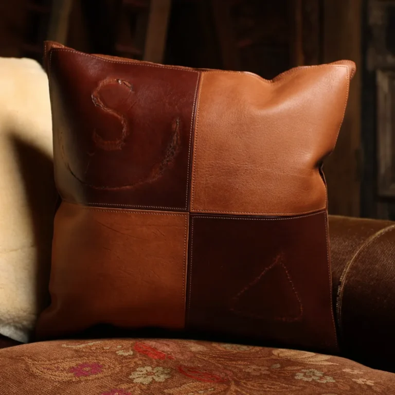 front side of a branded leather pillow