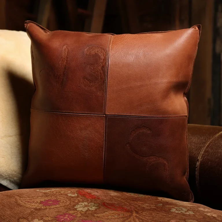 front side of a branded leather pillow