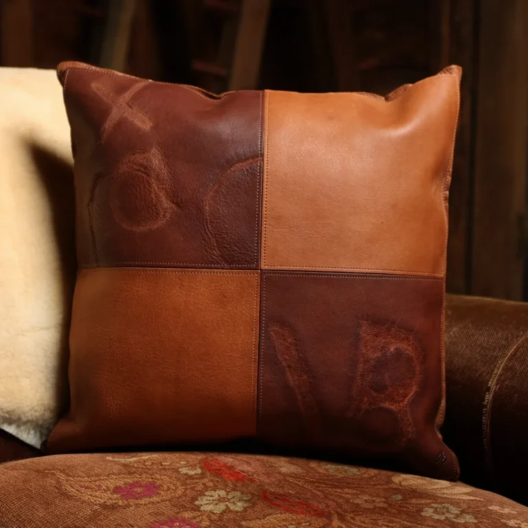 front side of a branded leather pillow
