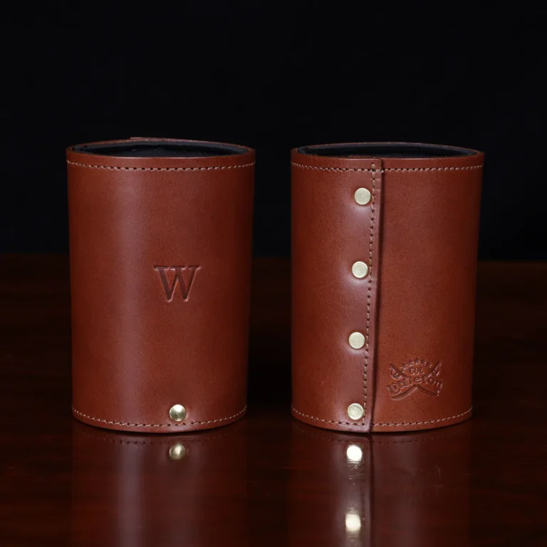two brown leather can caddies with personalized initial stamp